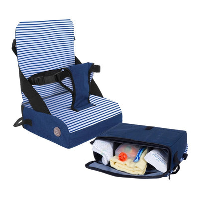 Blue denim-striped booster seat with safety harness, unzipped storage compartment showing child essentials.
