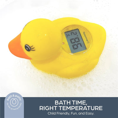 Yellow rubber duck thermometer floats in soapy water, displaying a digital temperature reading of 88°F.
