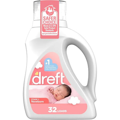 Dreft Stage 1 Newborn Baby Liquid Laundry Detergent bottle, 32 loads, featuring a sleeping baby on the label and a Safer Choice tag.