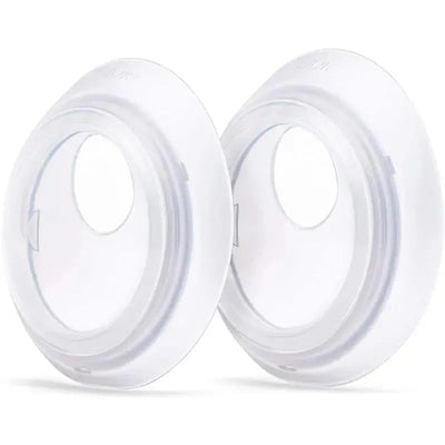 Two transparent Elvie milk collection cups designed for secure milk storage during breastfeeding.