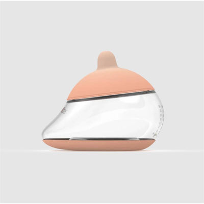 Anatomy bottle with a fair-colored nipple, shaped for easy feeding, featuring a transparent body and stylish design.