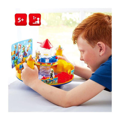 A child engages with the Epoch - Bl Super Mario Castle Land playset featuring colorful towers, figures, and interactive elements.