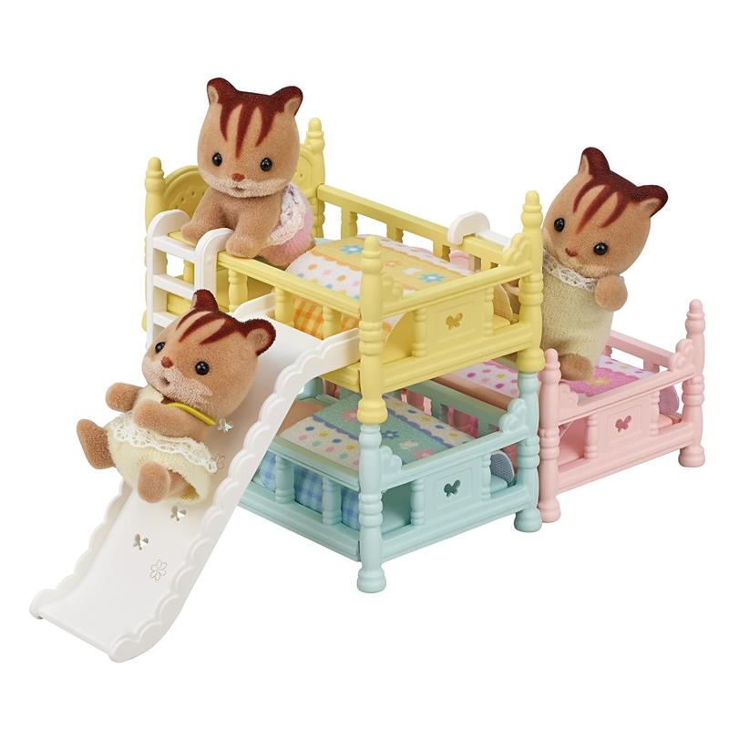 Epoch Calico Critters Triple Bunk Beds Set with four critter figurines playing and a slide, featuring colorful beds and blankets.