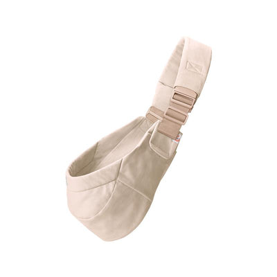 Ergobaby Upsie Sling Baby Carrier in light beige, featuring a padded shoulder strap and secure buckle, designed for carrying babies and toddlers.