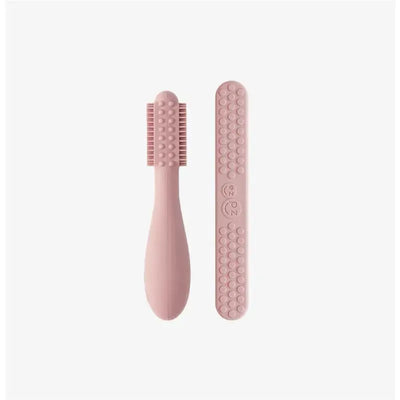 Baby-Led™ toothbrush and sensory tongue depressor dual pack in blush, designed for infant oral care.
