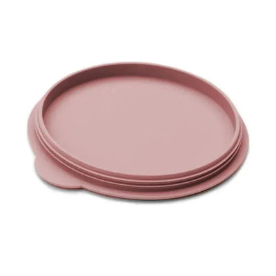 Blush-colored lid for the Ezpz Mini Bowl, designed to fit securely and help prevent spills.