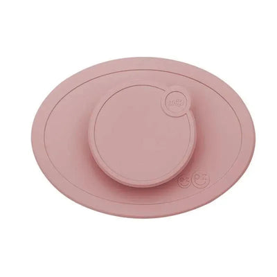 Tiny bowl lid in blush color designed to fit Ezpz Tiny Bowl, featuring a rounded edge and integrated handle.