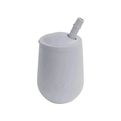 Ezpz Mini Cup & Straw Training System in pewter color, featuring a rounded design and attached reusable straw.