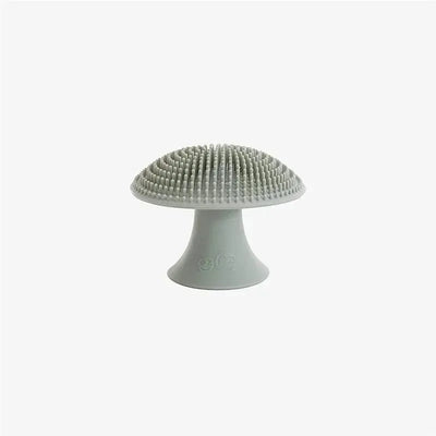 Sage-colored Ezpz Mushroom Sponge with textured top for effective cleaning.
