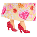 Fisher Price Disney Princess Fashion Doll Reveal - Belle, featuring vibrant red high heels and a colorful skirt adorned with gems.