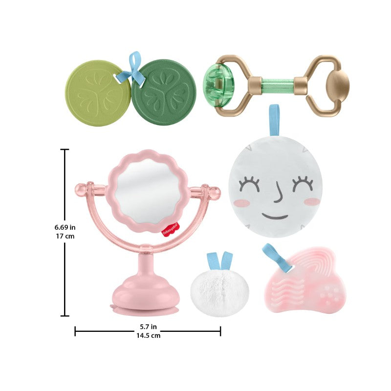 Toy set featuring a pink mirror, soft face cloth, textured comb, and accessories, designed for imaginative play.
