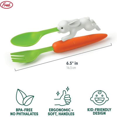 Nesting kids utensils featuring a green spoon with a white rabbit and an orange carrot-shaped fork, measuring 6.5 inches.