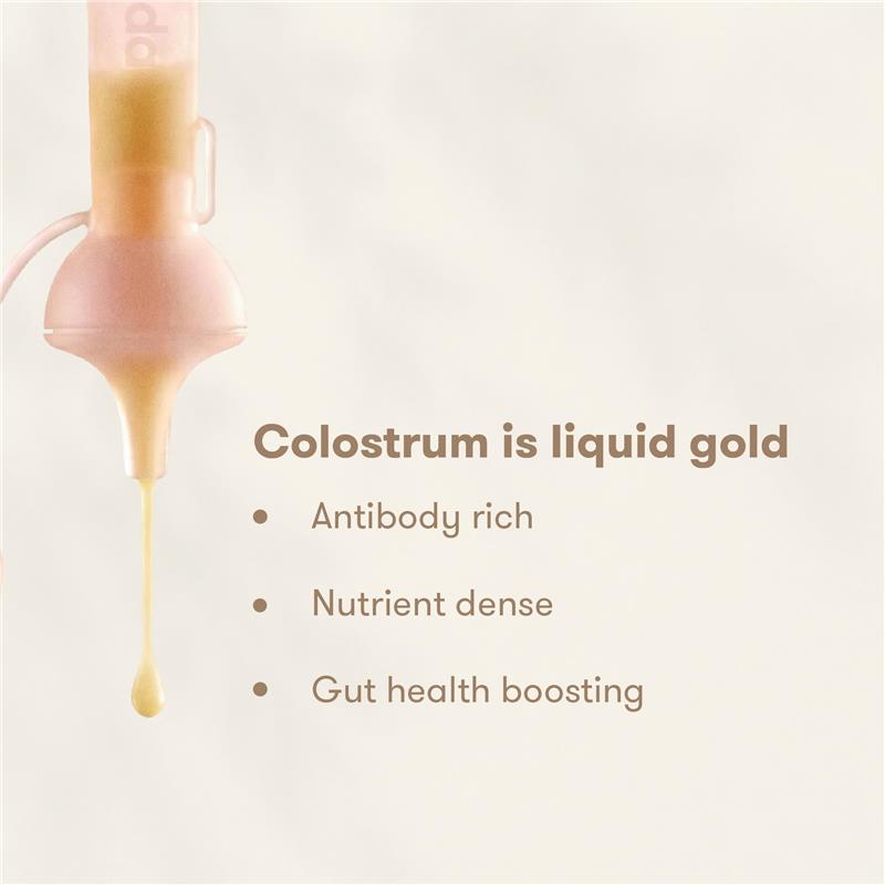 Frida Mom 15Pk Colostrum Collection Kit with colostrum dripping, highlighting its benefits: antibody rich, nutrient dense, gut health boosting.