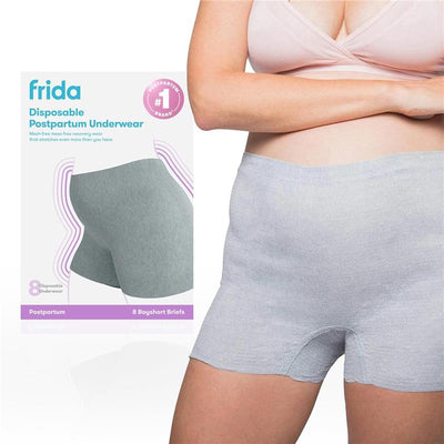 Frida Mom disposable postpartum boyshort underwear in gray, featuring a cozy fit, marketed as recovery wear for new mothers.
