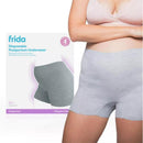 Frida Mom disposable grey postpartum underwear in LX/XL size displayed on a model with packaging in the background.