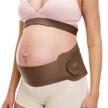 Dual support belly band for pregnancy in cocoa color, worn around a pregnant belly, offering support and comfort.