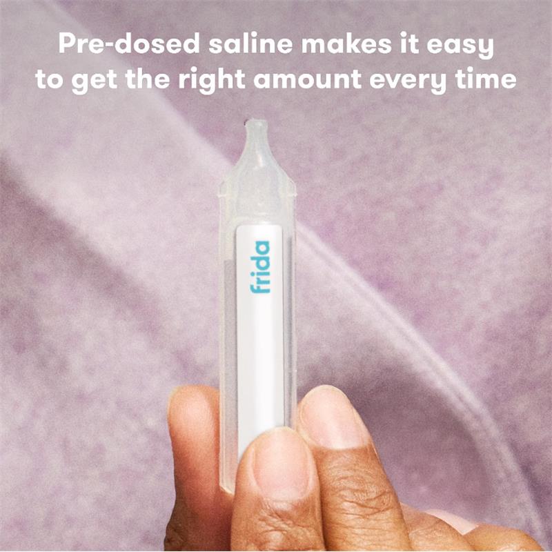Pre-dosed sterile saline vial by Fridababy held in a hand, designed for easy dosage during nebulizer use.