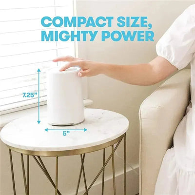 Fridababy 3-in-1 Air Purifier with visible dimensions, showcasing compact design and usage on a marble side table.
