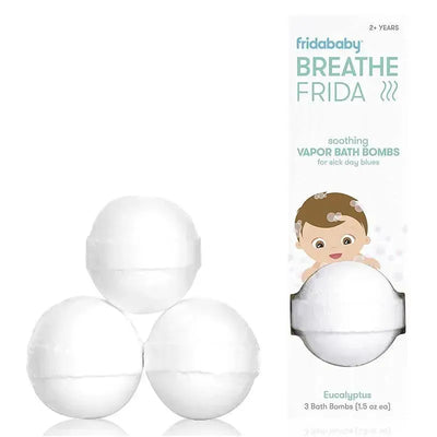 Three white BreatheFrida vapor bath bombs, labeled for soothing bath use, with eucalyptus scent, packaged beside a cartoon child.