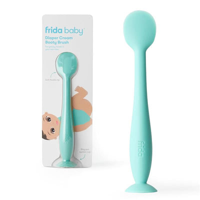 Fridababy Diaper Cream Booty Brush with a soft flexible tip and suction cup base, designed for easy application of diaper cream.