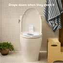 FridaBaby Drop Down Potty Training Seat on a toilet, designed for toddlers, with drop-down feature for easy use.
