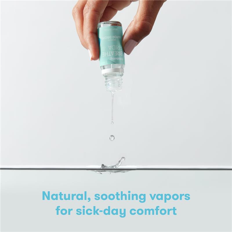 FridaBaby Eucalyptus & Lavender Essential Oil bottle being tipped to release drops into water, promoting soothing vapors for comfort.