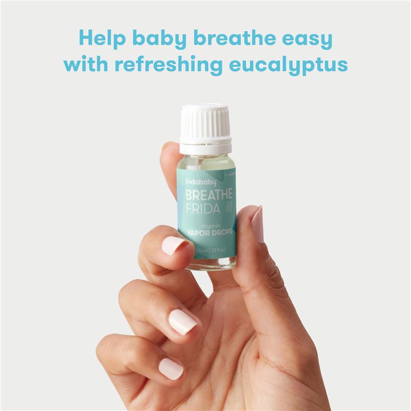 FridaBaby Breathe Frida organic vapor drops in a hand, promoting easy breathing with eucalyptus scent.