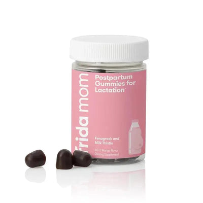 Fridababy Mom Postpartum Gummies for Lactation, mango flavor, in a clear jar, with three gummies displayed.