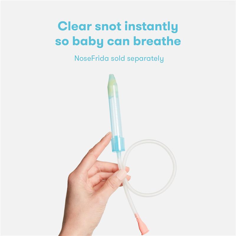 NoseFrida saline mist spray for infants, held in a hand, with a mint green tip and flexible tube for nasal decongestion.