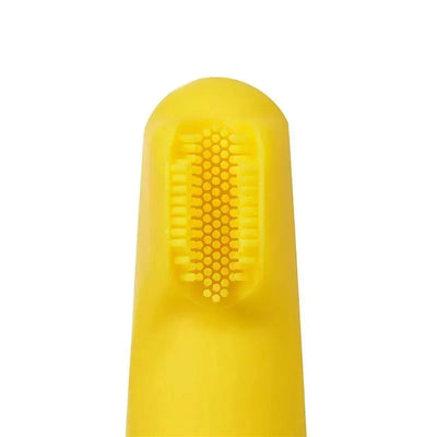 Manual toothbrush designed for infants, featuring a soft yellow silicone bristle head for gentle cleaning.