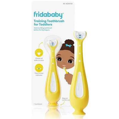 Yellow Fridababy training toothbrush for toddlers, with cleanable sides, time-to-toss indicator, and suction cup.