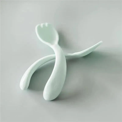 Light sage plastic spork set featuring a spoon and fork combination, designed for easy handling by children.
