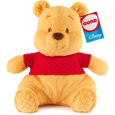 Gund Oh So Snuggly Winnie The Pooh plush toy with a yellow body and red shirt, featuring soft fabric and a charming expression.