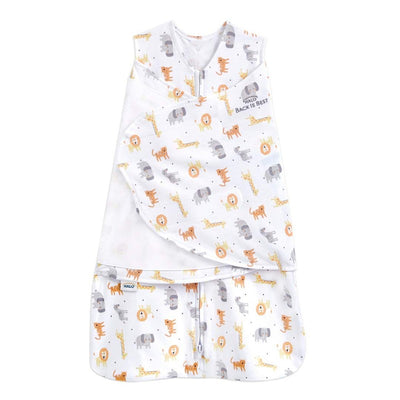 Halo Sleepsack Swaddle Jungle in 100% cotton, featuring playful animal prints including lions, elephants, and giraffes.