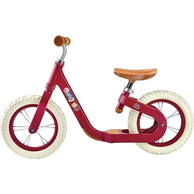 Red Hape Learn To Ride balance bike featuring white rubber tires and a wooden seat, designed for young children to enhance balance skills.