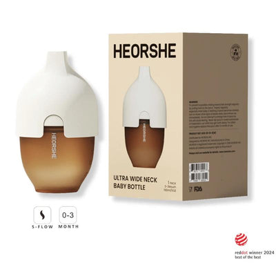 Ultra wide neck baby bottle by Heorshe, 5oz/160ml, in white with a brown base, with packaging visible beside it.