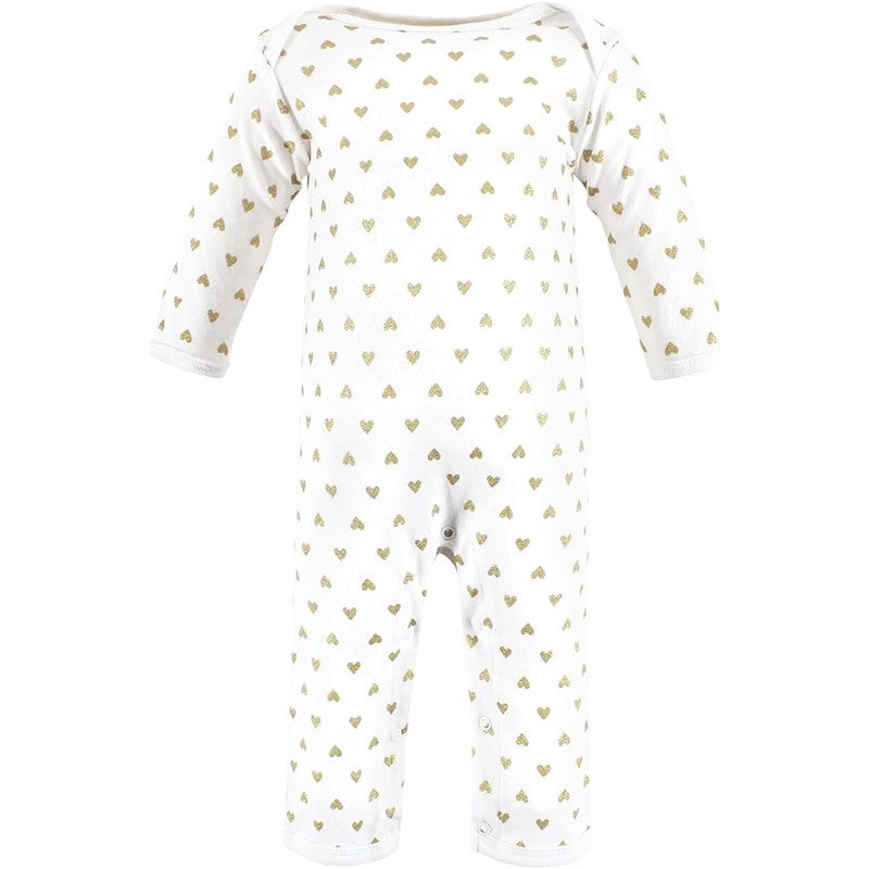 Cotton coverall for girls featuring a white base with gold heart patterns and snap closures at the bottom.