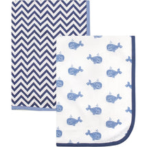 Interlock cotton swaddle blankets in a two-pack featuring whale and chevron patterns in blue and white.