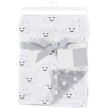 Reversible gray mink blanket with smiling cloud pattern on one side and star pattern on the other, tied with a ribbon.