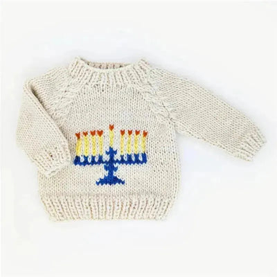 Menorah crew neck sweater for baby and toddler, featuring a knitted menorah design in blue, yellow, red, and orange.