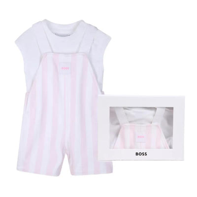 Light pink striped overalls with a white T-shirt, packaged in a box with a window displaying the set.