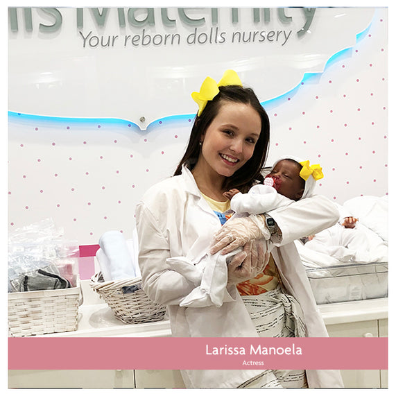 Larissa Manoela adapting a Reborn Baby Doll at the MacroBaby Dolls Maternity in Orlando, Florida
