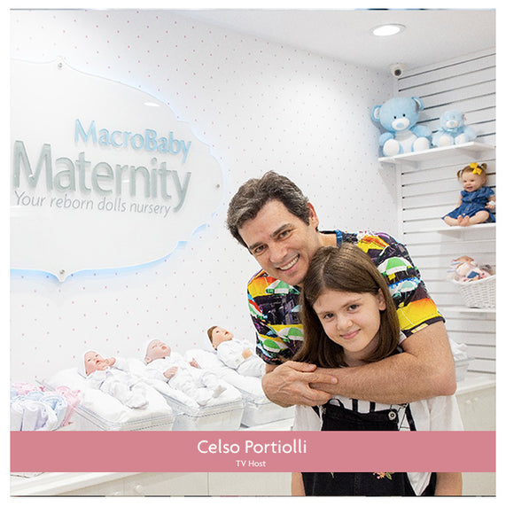 Celso Portiolli with his daughter shopping for dolls at the MacroBaby dolls maternity experience in Orlando, Florida