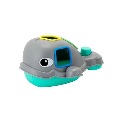 Soft gray and teal toy whale with large eyes, featuring openings and colorful accents for interactive play.