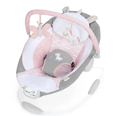 Soothing baby bouncer seat in pink and gray, featuring a unicorn and butterfly toys with vibration settings.
