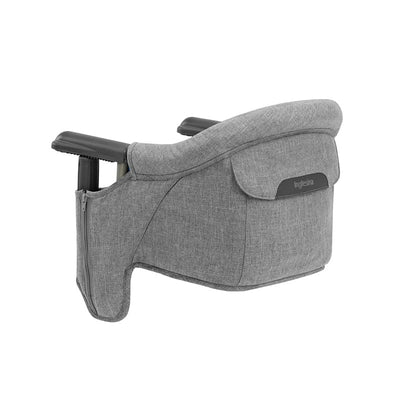 Fast Table Chair in Stone Gray Melange, featuring a padded backrest and side pocket for convenience.