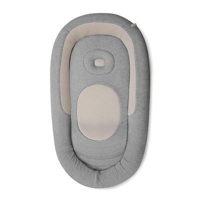 Soft gray Inglesina Welcome Pod Lounger featuring a padded design and mesh details for infant comfort and support.
