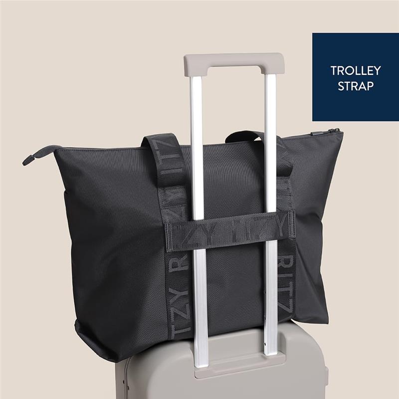 black travel tote bag with luggage sleeve Itzy Ritzy Belong All-In-Tote
