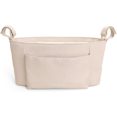 Itzy Ritzy Belong Carry-All Caddy in Toast color, featuring a spacious interior and front pocket for organization.