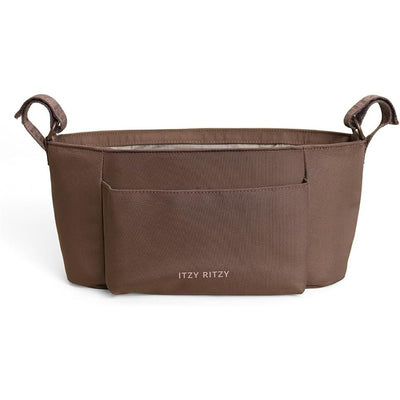 Brown Itzy Ritzy Belong Carry-All Caddy with two handles and a front pocket for organizing baby essentials.